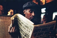 man reading newspaper